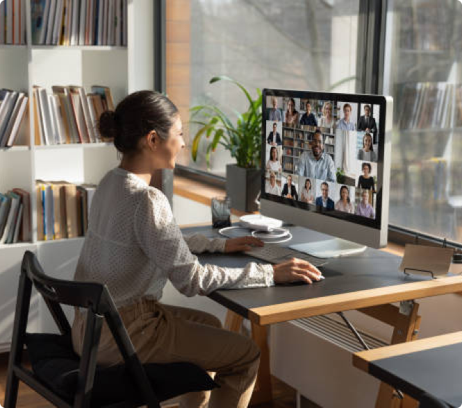 women smiling during online meeting